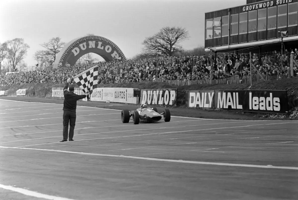 Rich Ginther crosses the line at the 1967 Race of Champions at Brands Hatch.