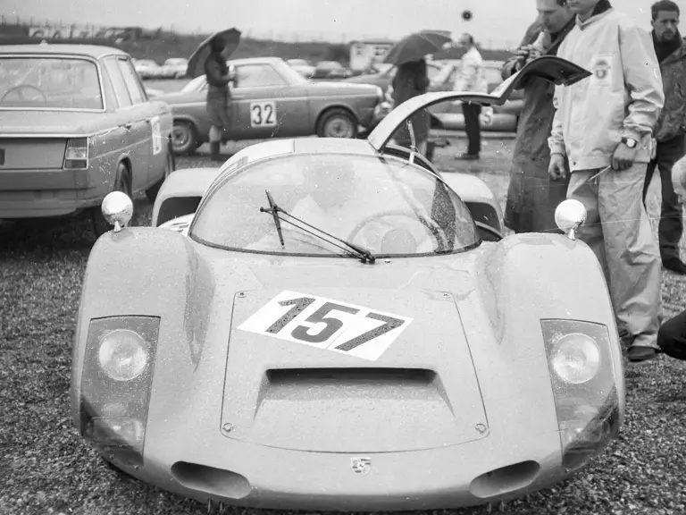 The 906 is captured at Zandvoort Circuit on 24 April 1966, just before its debut race where Wim Loos finished 1st in Class.