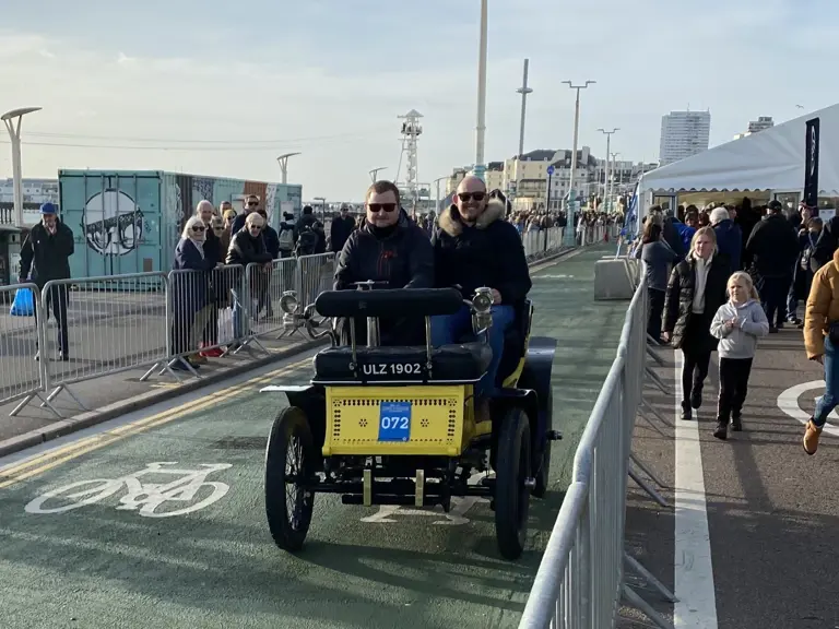The De Dion-Bouton is pictured participating in the London to Brighton Veteran Car Run.