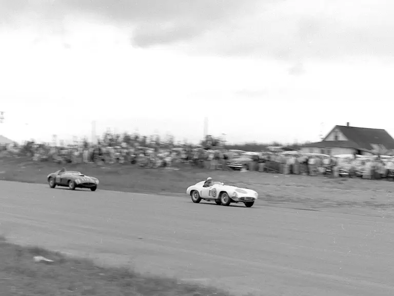 Phil Hill in a Ferrari 750 Monza (#3) temporarily leads Carroll Shelby in chassis no. 0478 AM (#103) before Shelby passed him for good in the feature race at the 31 July 1955 SCCA Nationals held at Bremerton, Washington.