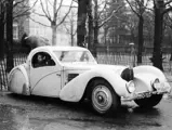 Mme Claire Descollas with 57384 midway through the 1937 Rallye Paris - St. Raphaël.