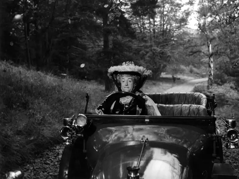 The Sunbeam appeared in the 1959 film The Mouse That Roared, where it wore the prop registration “G XII”. Peter Sellers is pictured behind the wheel as Duchess Gloriana XII.