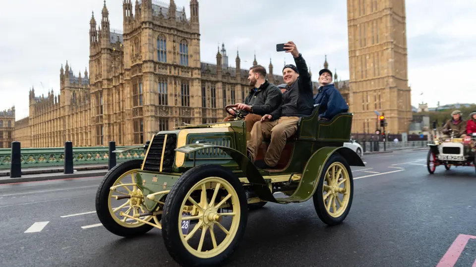 The Boyer crosses Westminster Bridge during the 2023 edition of the London to Brighton Veteran Car Run.