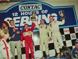 Mark Sandridge and team celebrating a 1st in class finish at the 12 Hours of Sebring, 1994.