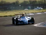 Ayrton Senna at speed in the Ralt RT3 during the British Formula 3 race at Thruxton in November 1982, where he finished first.