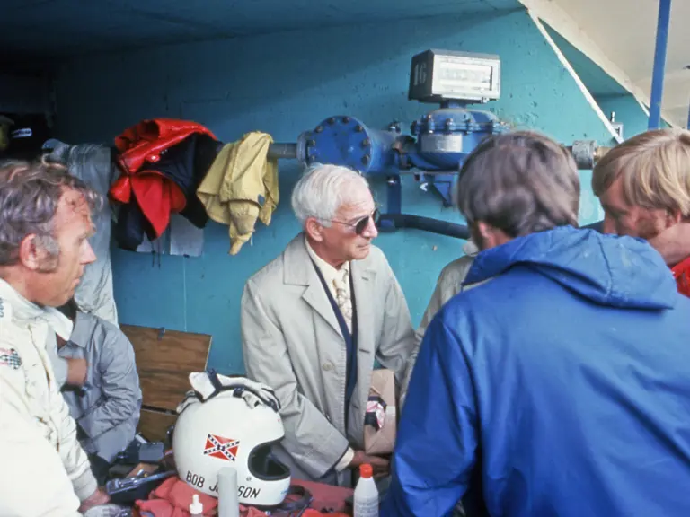 Zora Arkus-Duntov meeting with Bob Johnson and RED/NART team members in the #4 Corvette’s pit box at the 24 Hours of Le Mans, 1972.