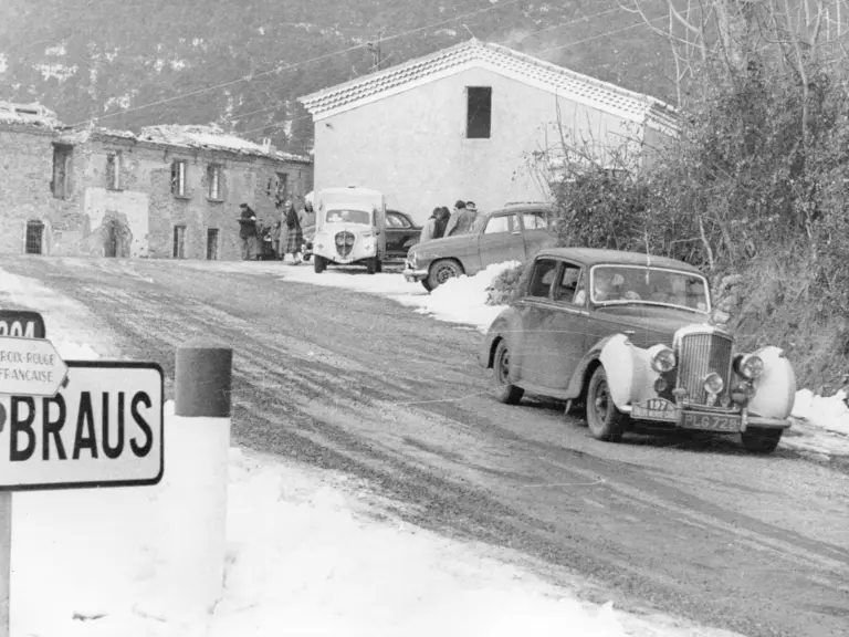 Exiting the famous Col de Braus stage of the 1953 Monte Carlo Rallye, note the protective covers on the front wings of the Bentley.