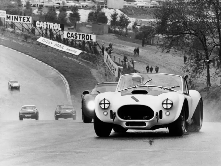 The team of Bob Bondurant and David Piper lead the way at Brands Hatch, 1966.