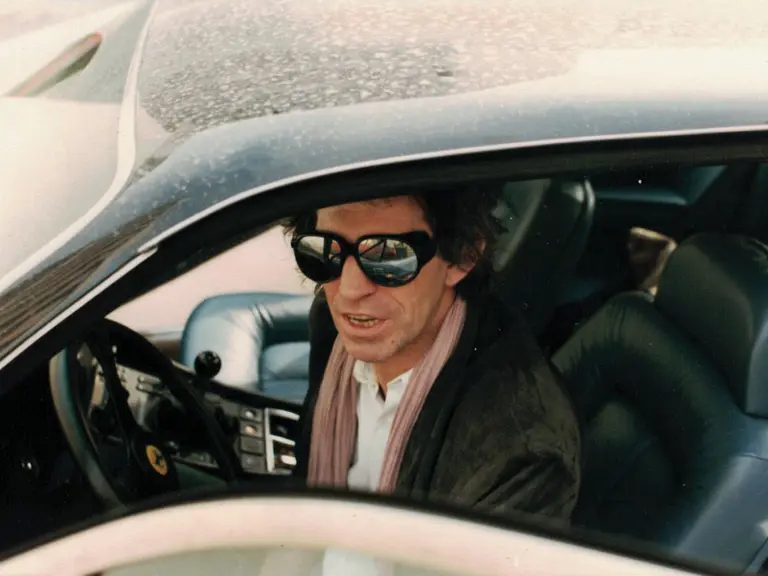 Keith Richards at the wheel of his new Ferrari 400i, which he received directly from the factory in the early 1980s.