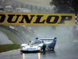 Chassis no. 956-110 races to a first place finish at Brands Hatch in 1983.