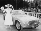 A woman poses next to chassis 0190 ED at the 1952 Paris Concours d’Elégance. The car was only one month old at the time.