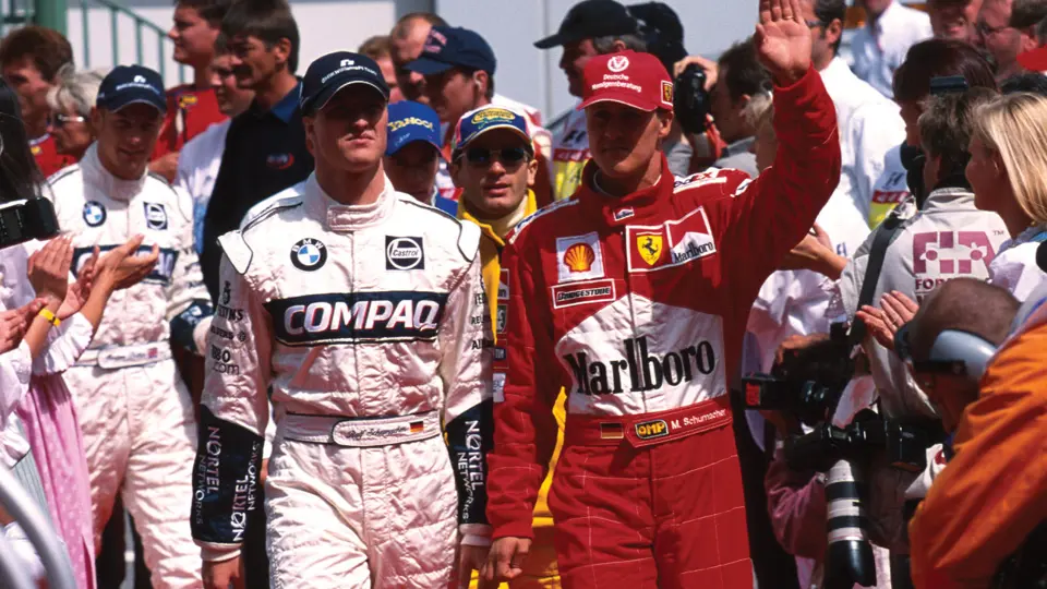 Michael Scumacher is pictured with brother, Ralf, at the 2000 Austrian Grand Prix. Michael Scumacher is pictured with brother, Ralf, at the 2000 Austrian Grand Prix.