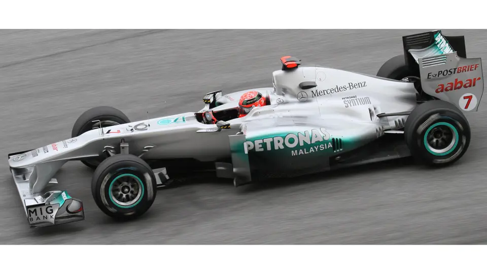 Michael Schumacher racing at the 2011 Malaysian Grand Prix. This image is for reference purposes only.
