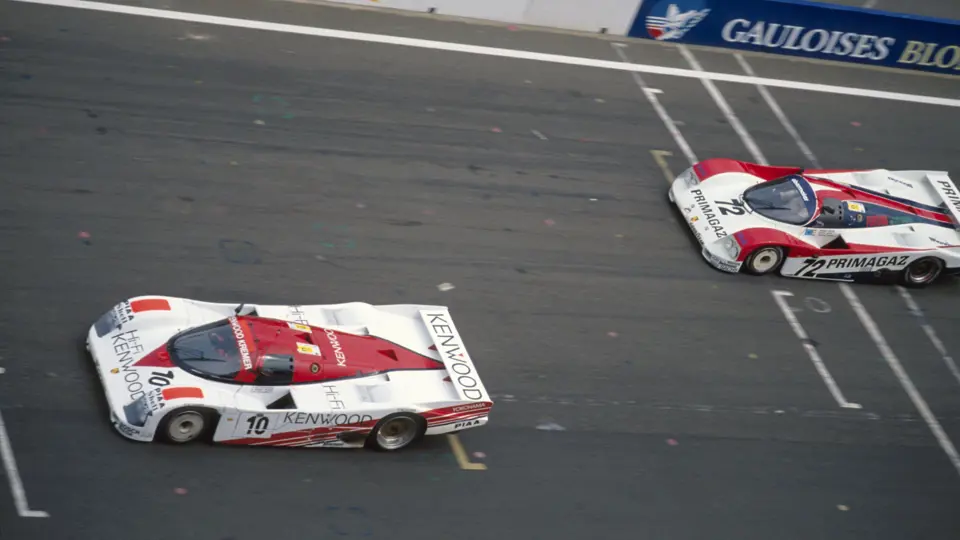Chassis CK6-88 leads the rival Porsche 962 C from Primagaz Compétition during the 1988 24 Hours of Le Mans.