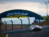 The 488 GTE Evo dashes past the Dunlop Bridge in the final hours of the 2021 24 Hours of Le Mans.