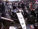 David Coulthard lowers himself into chassis MP4-16A-05 at the 2001 San Marino Grand Prix, where he would finish 2nd.