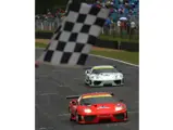 011 M during demonstration laps at the Ferrari Festival at Brands Hatch in August 2002.