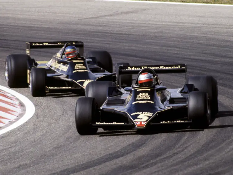Mario Andretti leads Ronnie Peterson at the 1978 French Grand Prix, both driving Lotus 79s. This image is for reference purposes only.