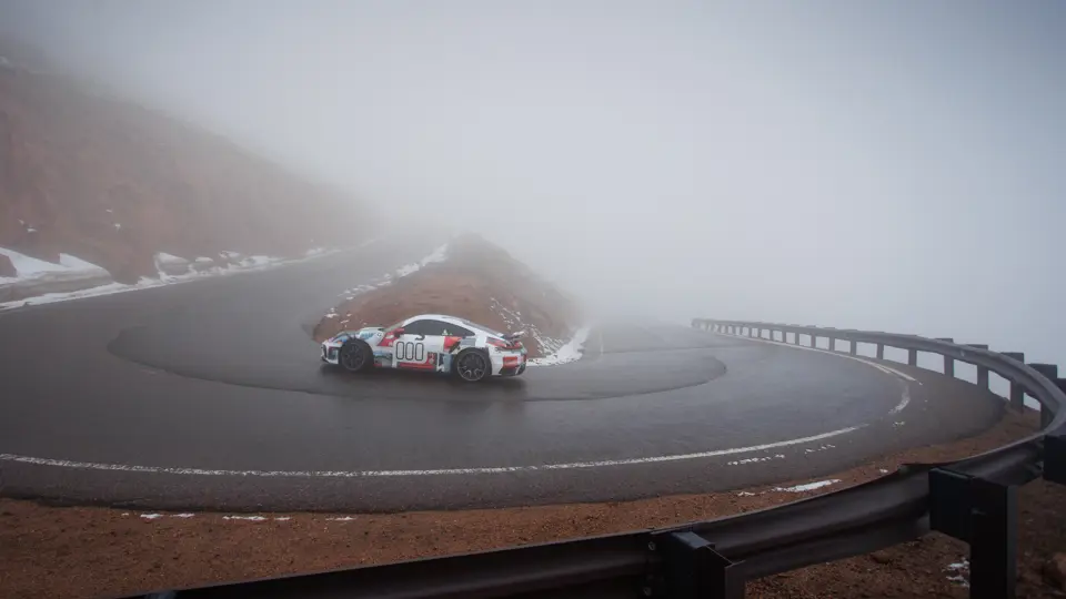 David Donner behind the wheel of the Porsche 911 Turbo S Lightweight at the 100th running of the Pikes Peak International Hill Climb, June 2022.