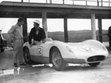 Masten Gregory talks to the legendary John Fitch in chassis 2427 at Nassau Speed Week, circa 1957.
