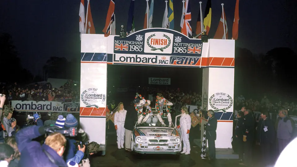 Henri Toivonen and Neil Wilson celebrate their victory after the 1985 Lombard RAC Rally.