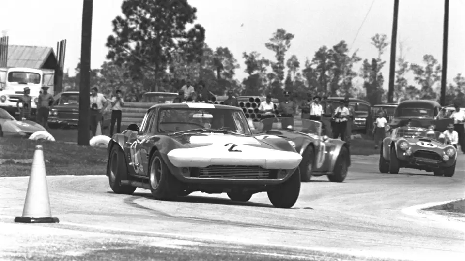 Chassis 003, race #2, leads Shelby American’s Shelby Cobra #1, driven by Ken Miles and John Morton, and Ecurie Ford France’s Shelby Cobra #14, driven by Jo Schlesser and Phil Hill, into a turn at the 1964 Sebring 12 Hours.