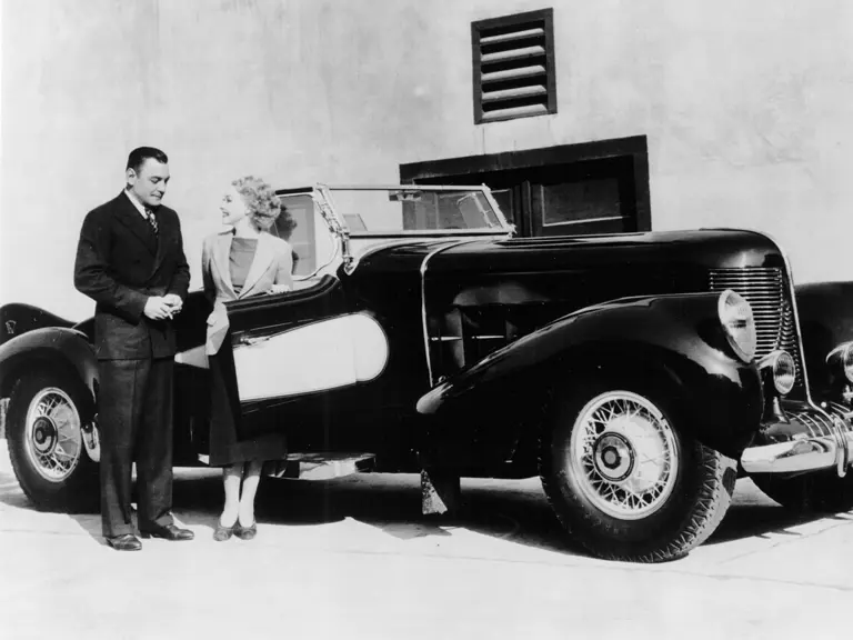 Buck Jones and Helen Twelvetrees pose with 1000459 on the Monogram Studios Lot, 1939.