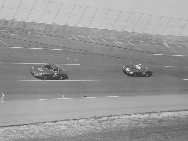 Paul Richards behind the wheel of chassis number 0200 (#82) traversing the high bank of Daytona closely followed by NARTS’s Dino 246 S (#9).