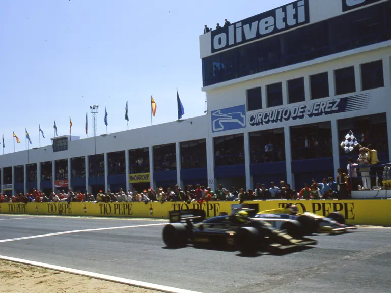 Ayrton Senna just beats Nigel Mansell to the checkered flag during the 1986 Spanish Grand Prix.