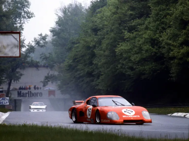 Driven by Maurizio Flammini, Spartaco Dini, and Fabrizio Violati, the Scuderia Supercar Bellancauto places 1st in the GTX class at a very wet 1981 1000 km di Monza.