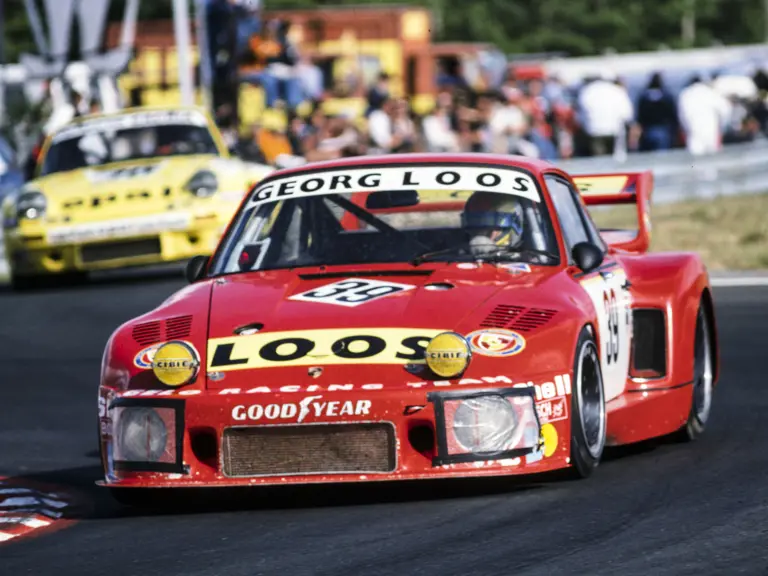 Porsche 935 #39 leads a Porsche 911 Carrera RSR at the 1977 24 Hours Le Mans.