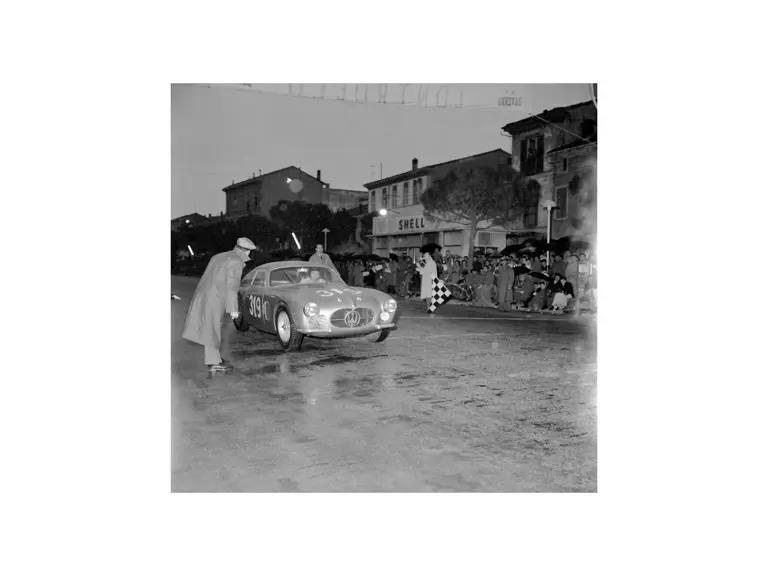Chassis no. 2124 reaches the checkpoint at Ravenna during the 1956 Mille Miglia.