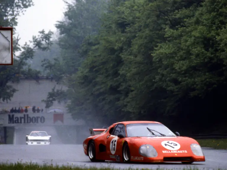 Driven by Maurizio Flammini, Spartaco Dini, and Fabrizio Violati, the Scuderia Supercar Bellancauto places 1st in the GTX class at a very wet 1981 1000 km di Monza.