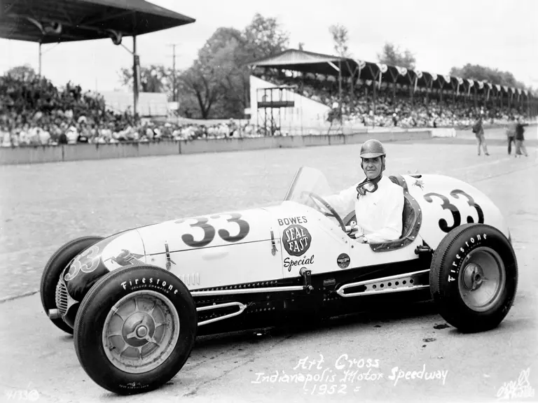 Art Cross sits in his Kurtis-Kraft during qualifying for the Indianapolis Motor Speedway, 1952.
