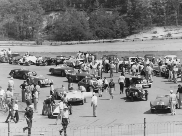 Chassis 85065 (second row, to the right) is captured at the Thompson Speedway in Connecticut, likely for an SCCA race.