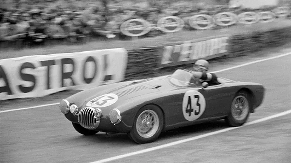 Diving into a corner, chassis 1147 is seen here on 13th June 1954 racing at the 24 Hours of Le Mans. Entered by Automobili OCSA, it was piloted by Lance Macklin and Pierre Leygonie.