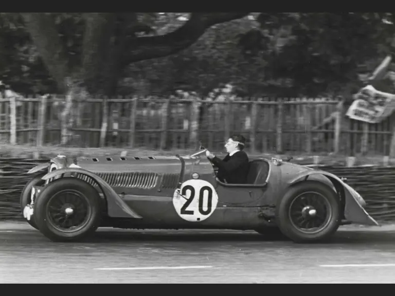 Rob Walker behind the wheel at he hurtles through a corner at the 1939 24 Hours of Le Mans.