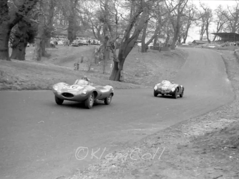 Peter Blond in XKD 518 stays ahead of the Alfa Romeo 6C 3000 CM at the British Empire Trophy Meeting, Oulton Park, 14 April 1956.