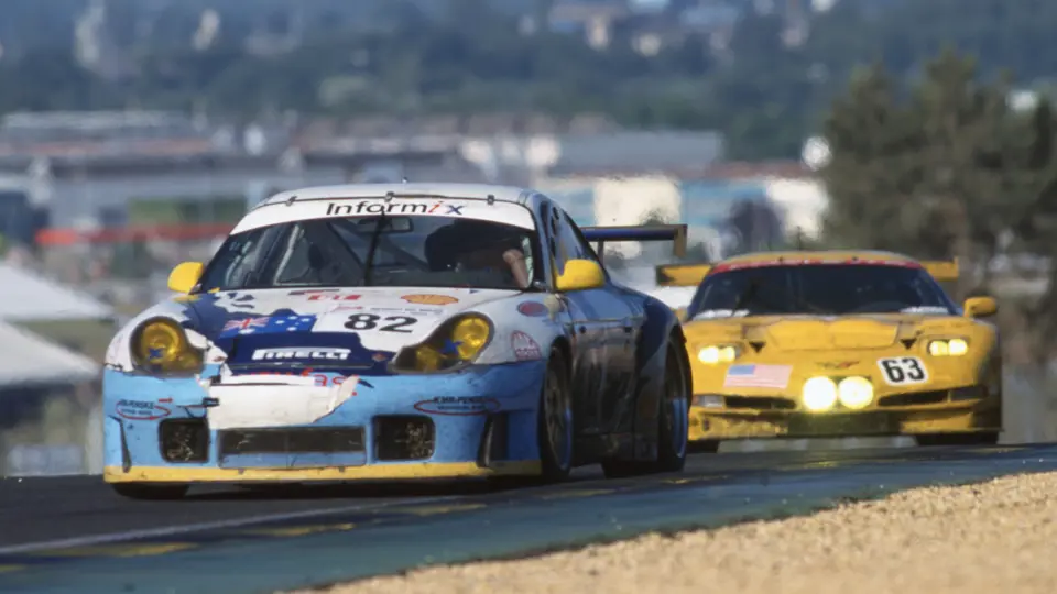 Seen here leading a Corvette C5-R, the 911 GT3 R climbed from 42nd to finish 17th overall at the 2000 24 Hours of Le Mans.