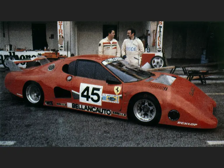 The Ferrari 512 BB/LM of Scuderia Supercar Bellancauto rests in the pits with drivers Fabrizio Violati and Duilio Truffo.