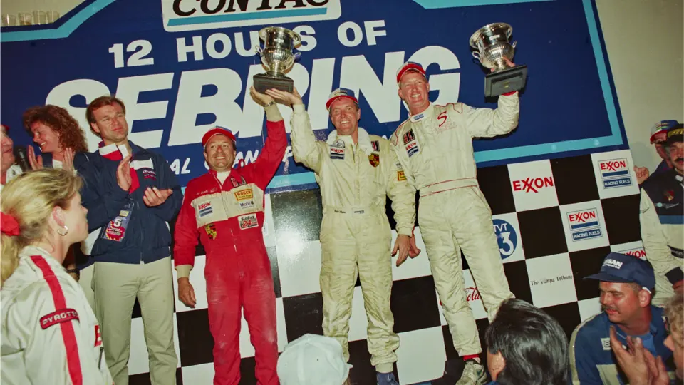 Mark Sandridge and team celebrating a 1st in class finish at the 12 Hours of Sebring, 1994.