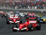 Michael Schumacher leads the field en route to a victory at the 2006 French Grand Prix.
