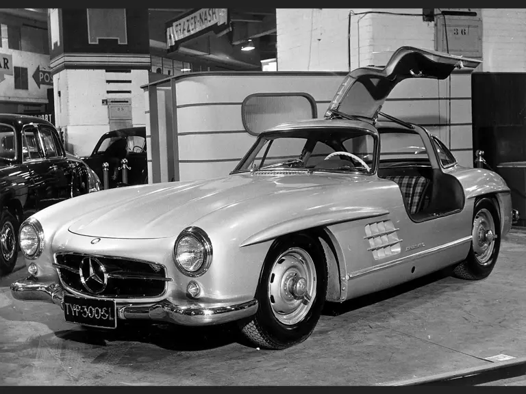 Chassis 4500012 basks in the limelight of the centre-stage as the 300 SL Gullwing was revealed at the 1954 Earls Court Motor Show.