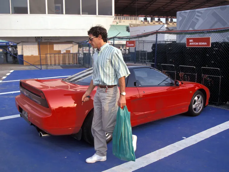 Ayrton Senna arrives at Circuito Estoril for the 1991 Portuguese Grand Prix in his Honda NSX.