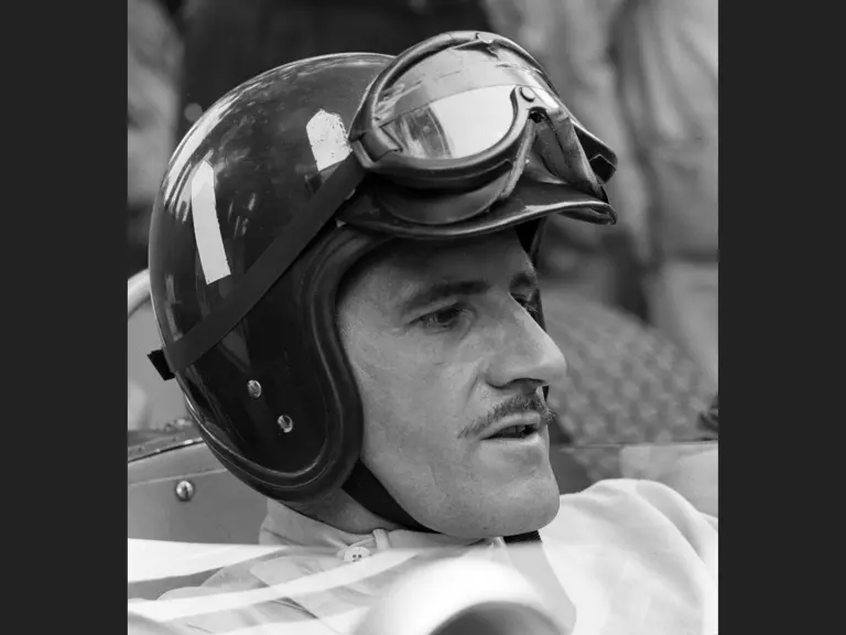 Graham Hill at the 1966 Monaco Grand Prix wearing his racing helmet. He finished in 3rd-place.