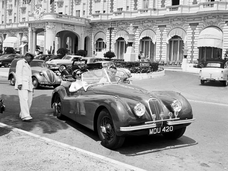 Clark Gable and Suzanne Dadolle depart the Carlton Hotel, Cannes 1953.