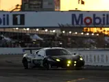 Ferrari 458 GTD #555 from AIM Autosports competes at the 2014 Sebring 12 Hours.