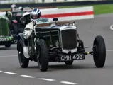 The Frazer Nash TT Replica is captured racing in the Earl Howe Trophy as part of the 78th Goodwood Members’ Meeting.
