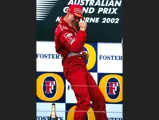 Michael Schumacher (GER) Ferrari celebrates after winning a very dramatic race in last years car, the F2001.
Australian Grand Prix, Melbourne, Australia. 3 March 2002.