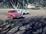 Enrique Escobar battles against a BMW 328 at a local race in Buenos Aires. The driver was given an award by Piero Dusio after the race.